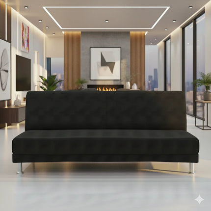 Canapé noir moderne dans un salon lumineux avec cheminée et grande baie vitrée