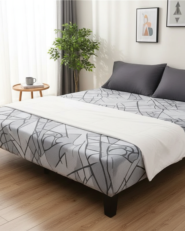 Housse de clic clac géométrique grise. – Protection canapé convertible – Photo Variation 3